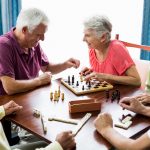 Seniors playing games in a retirement home